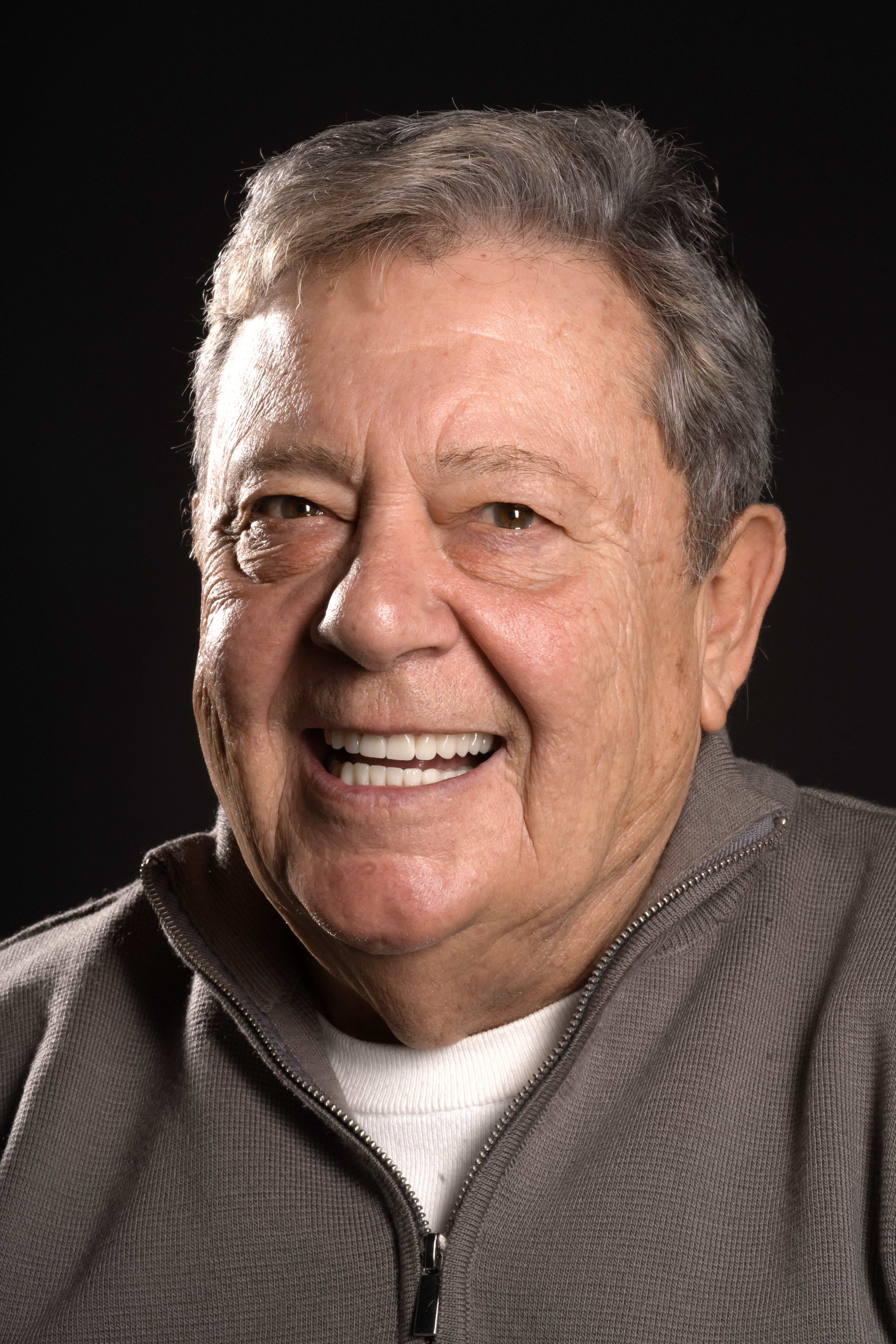 After - Full-Mouth Rehabilitation with Crowns and Implants
